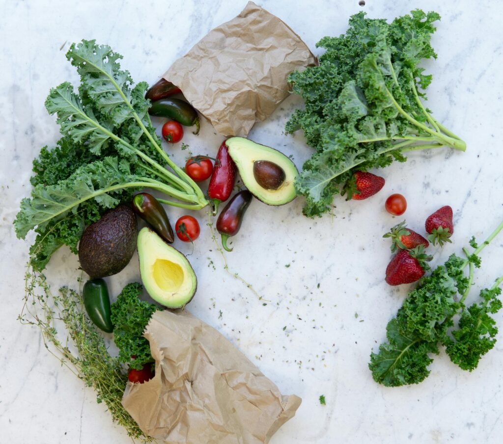 Clean Eating: Showcasing green vegetables, red fruits, and salads containing relevant nutrients.